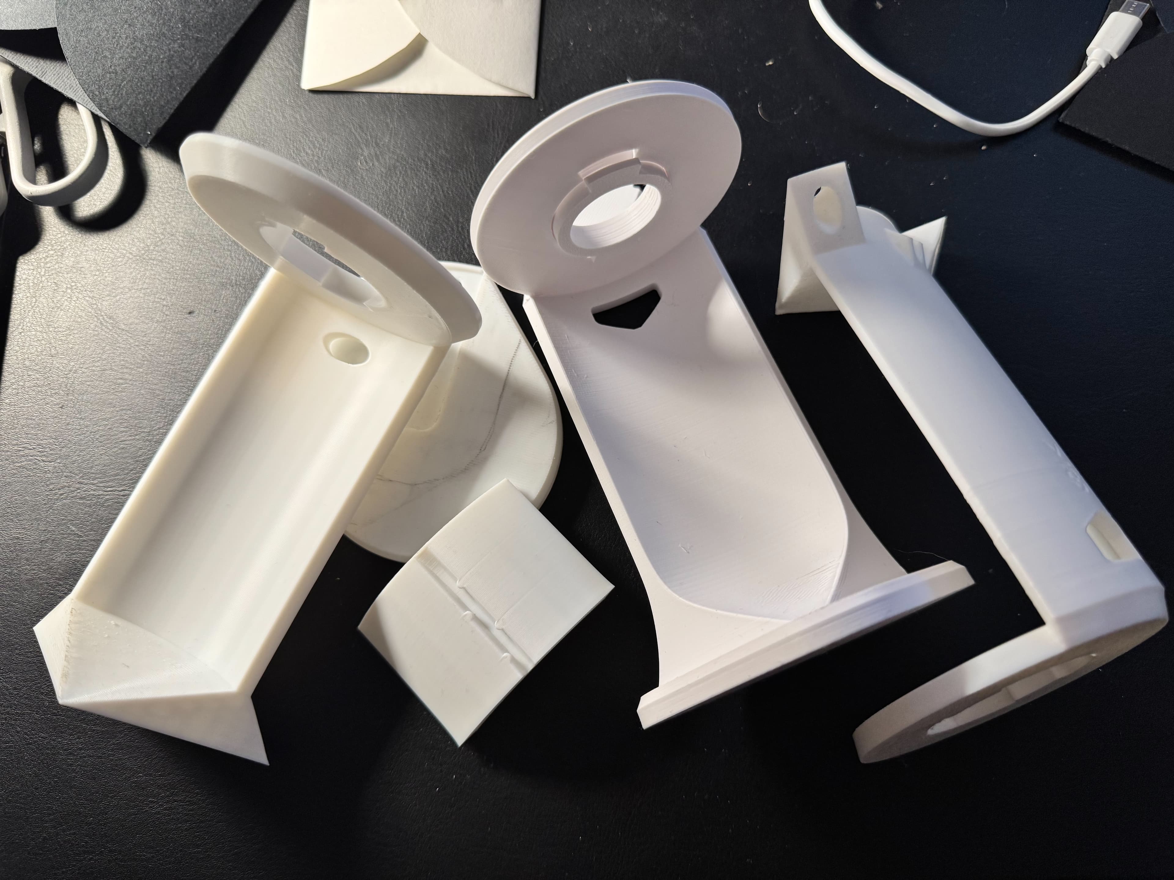 A line-up of earlier prototype prints, kept as references.
